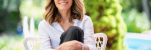 smiling middle aged woman outside