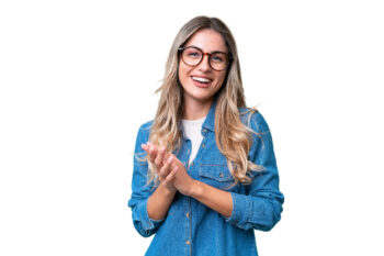 Woman smiling in glasses on white background