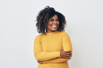 Smiling woman on white background