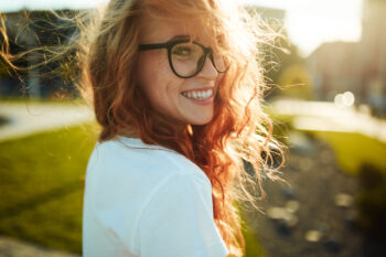 Portraits of a charming red-haired girl